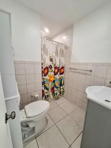 a view of a hallway with entryway and closet