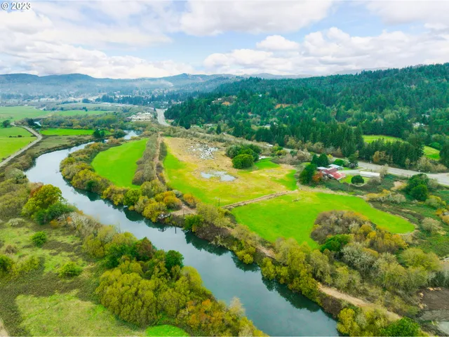 a view of a city with mountains in the background