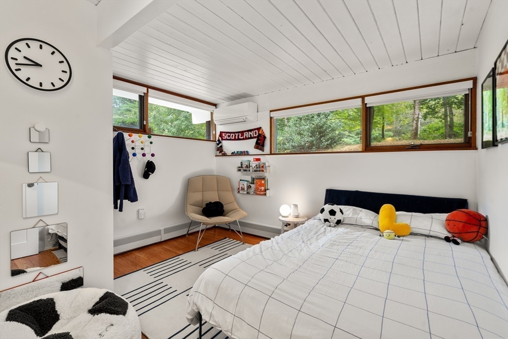 43 Willowdale Road Topsfield, MA 01983 - Photo 20 of 34 a bedroom with a bed and a window