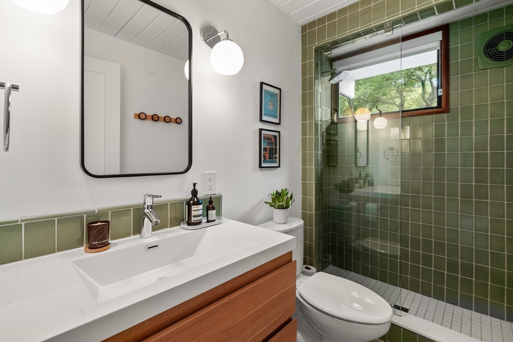 43 Willowdale Road Topsfield, MA 01983 - Photo 21 of 34 a bathroom with a sink a toilet and shower