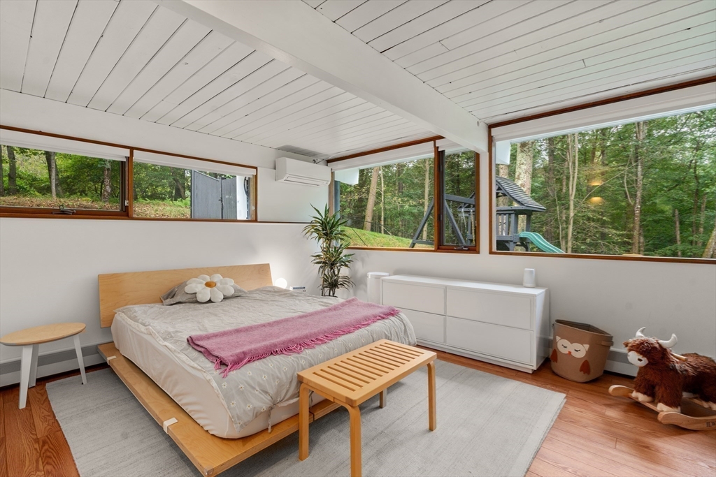 43 Willowdale Road Topsfield, MA 01983 - Photo 22 of 34 a bedroom with furniture and a large window