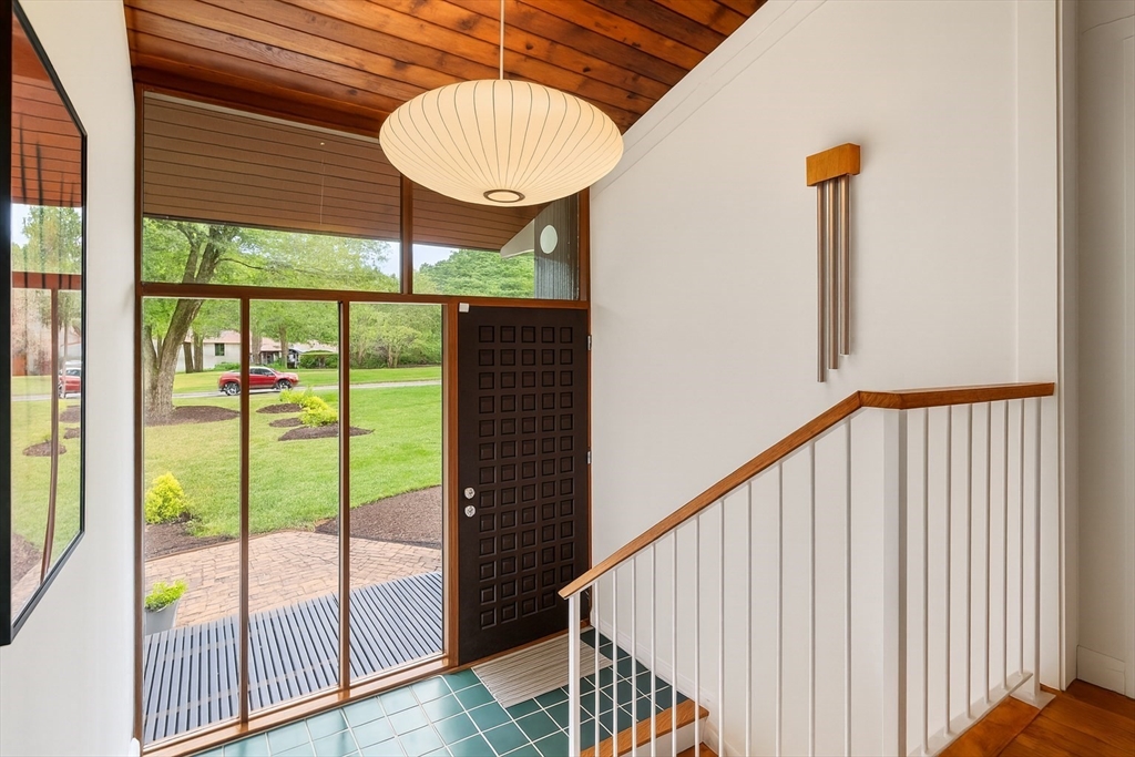 43 Willowdale Road Topsfield, MA 01983 - Photo 3 of 34 wooden floor in an empty room with a window
