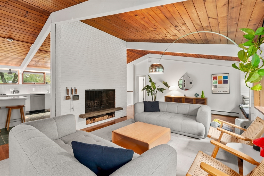 43 Willowdale Road Topsfield, MA 01983 - Photo 7 of 34 a living room with furniture and a flat screen tv