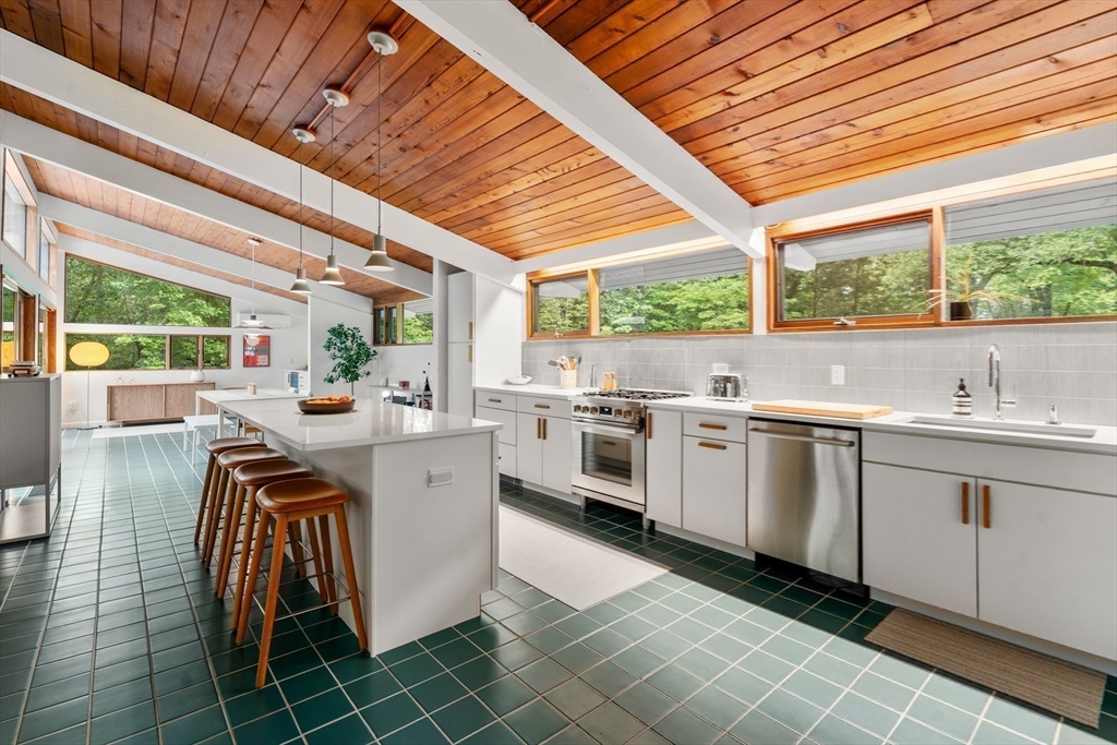 43 Willowdale Road Topsfield, MA 01983 - Photo 9 of 34 a kitchen with stainless steel appliances a sink window and cabinets