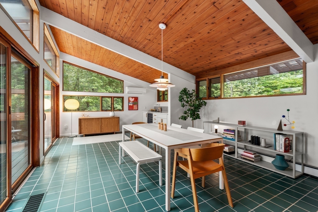 43 Willowdale Road Topsfield, MA 01983 - Photo 10 of 34 a view of a patio with table and chairs