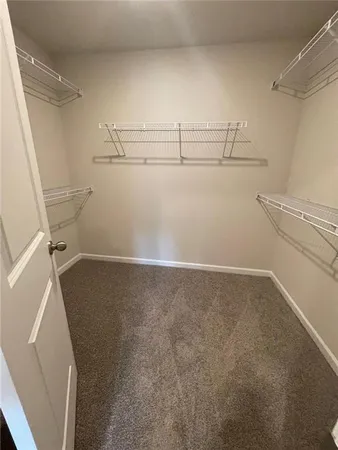 a view of a room with racks on the wall