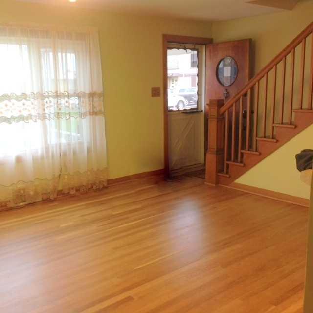 453 School Indiana, PA 15701 - Photo 5 of 11 Living Room. Beautiful Hardwood floors in living room that have just been sanded and stained. Big picture window that lets in natural light
