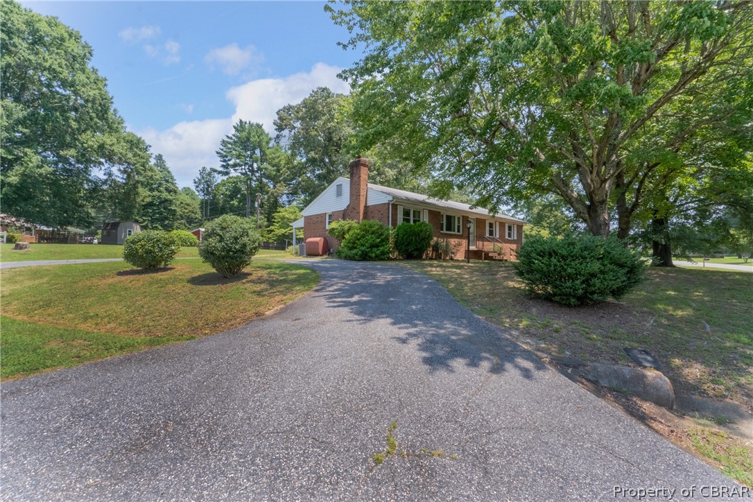 3721 Winterhaven Road Midlothian, VA 23112 - Photo 2 of 25 View of front facade featuring a front yard