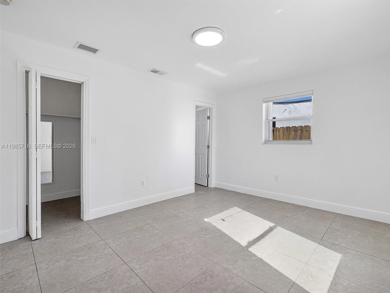 340 Northwest 45th Street Miami, FL 33127 - Photo 16 of 25 a view of an empty room with closet