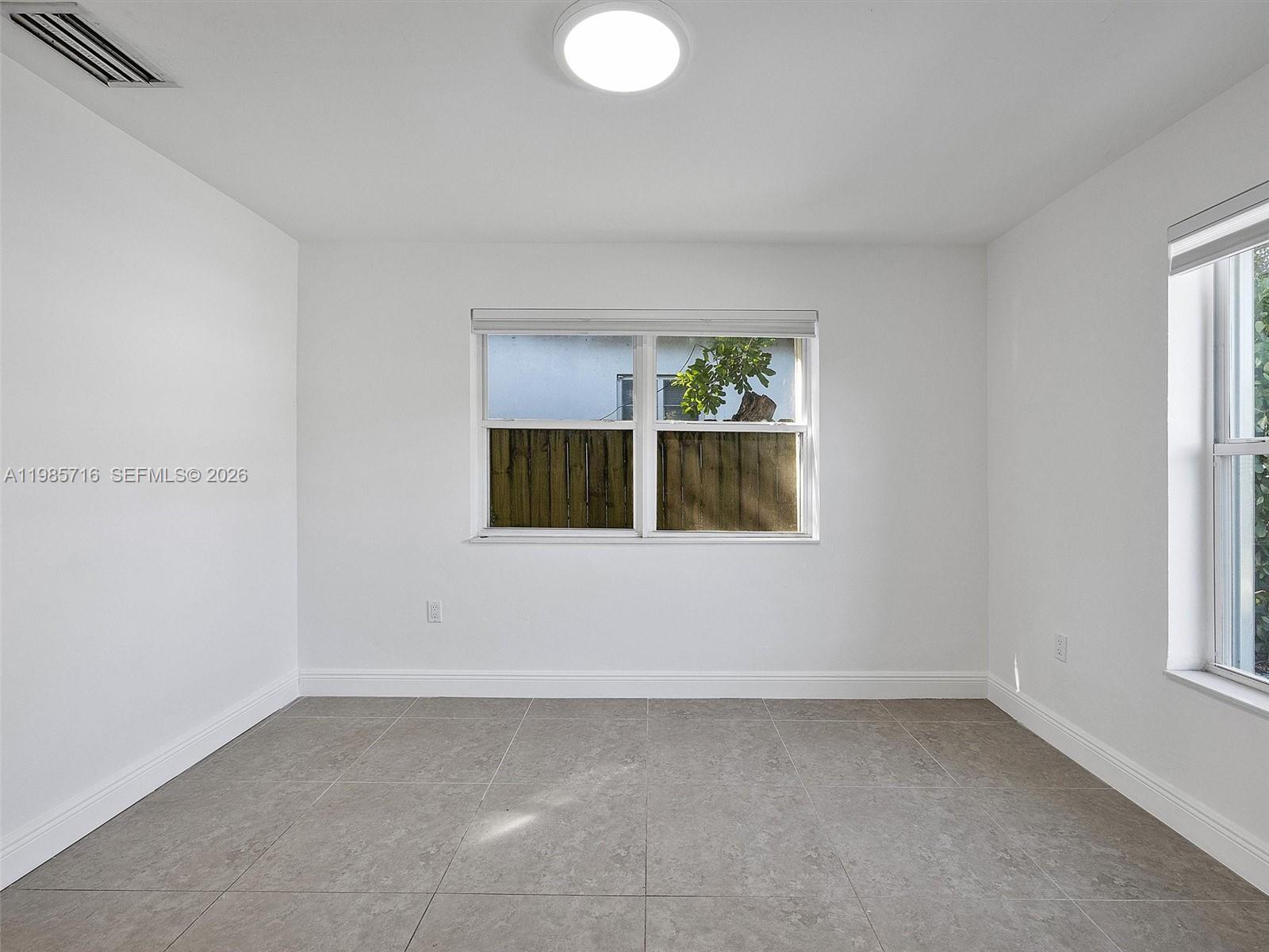 340 Northwest 45th Street Miami, FL 33127 - Photo 22 of 25 a view of utility room and window
