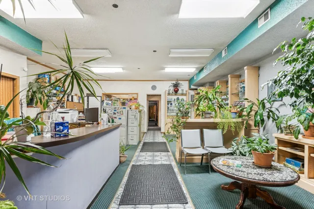 a view of a chairs and table in a patio