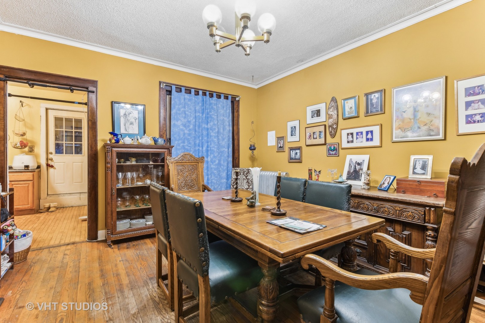 1622 West Devon Avenue Chicago, IL 60626 - Photo 27 of 36 a view of a dining room with furniture window and wooden floor
