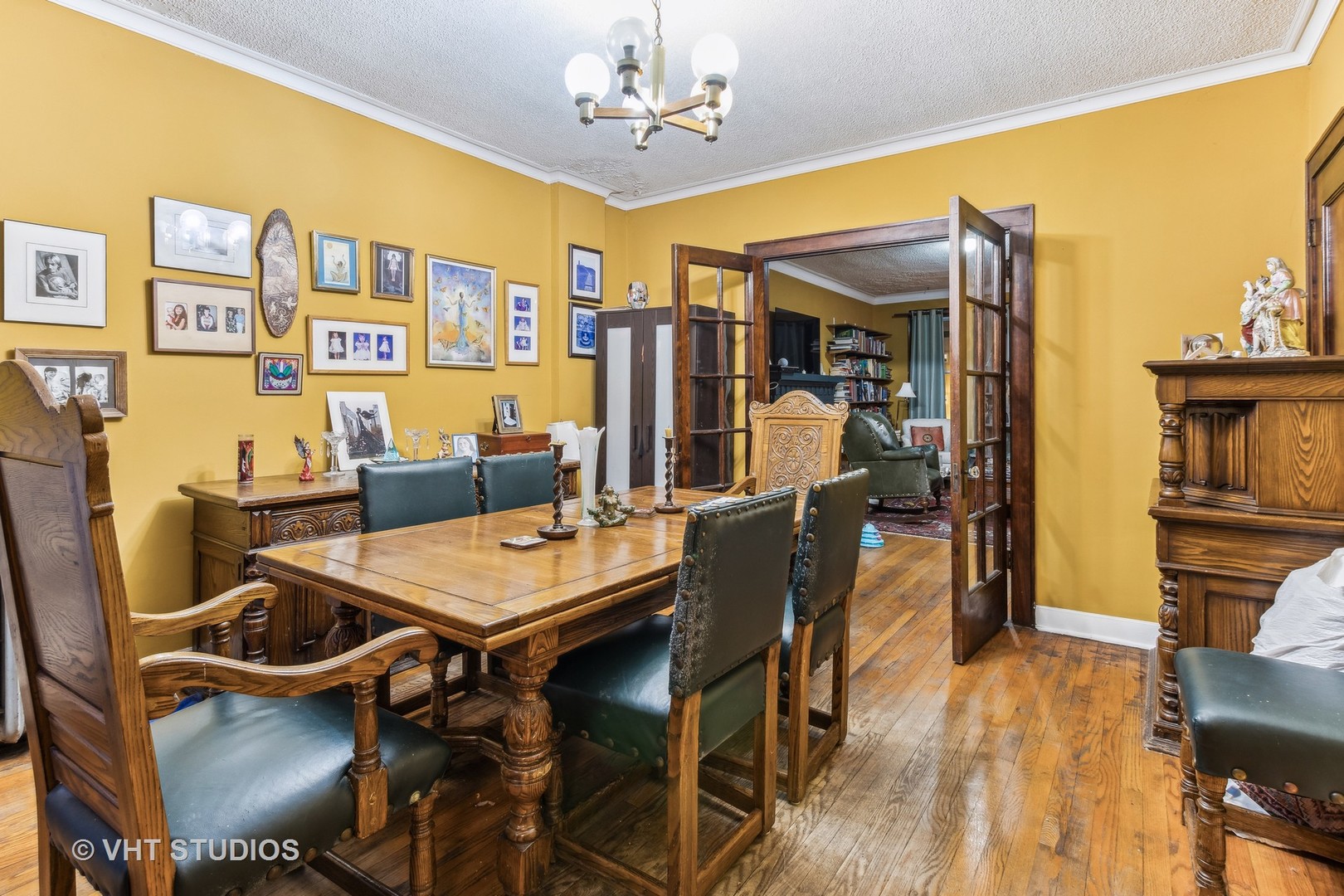 1622 West Devon Avenue Chicago, IL 60626 - Photo 28 of 36 a view of a dining room with furniture and wooden floor