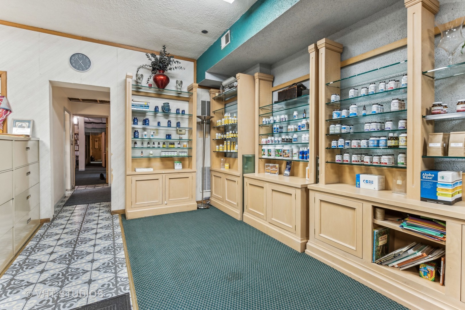 1622 West Devon Avenue Chicago, IL 60626 - Photo 4 of 36 a kitchen with stainless steel appliances cabinets and a large window
