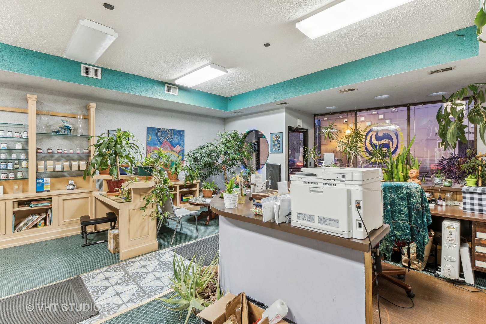 1622 West Devon Avenue Chicago, IL 60626 - Photo 5 of 36 a living room with fireplace furniture and a large window