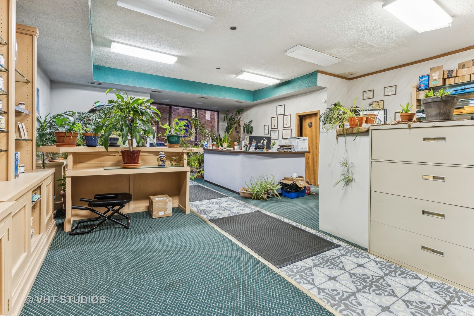 1622 West Devon Avenue Chicago, IL 60626 - Photo 6 of 36 a view of a workspace and kitchen