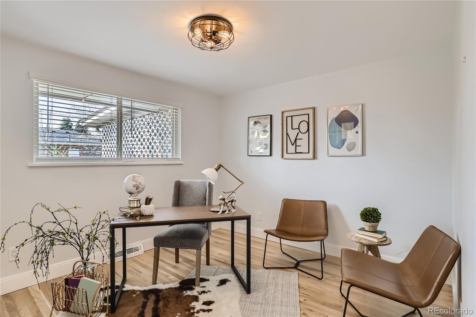 11676 West 37th Place Wheat Ridge, CO 80033 - Photo 16 of 30 a workspace with furniture and window