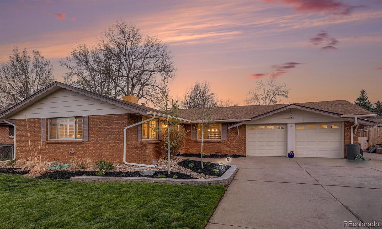 11676 West 37th Place Wheat Ridge, CO 80033 - Photo 2 of 30 front view of a house with a yard