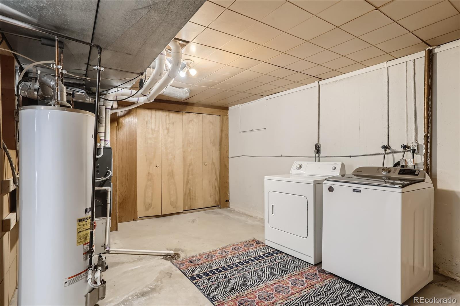 11676 West 37th Place Wheat Ridge, CO 80033 - Photo 22 of 30 a utility room with dryer and washer