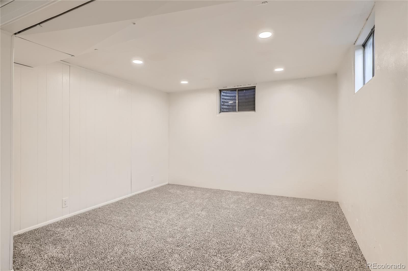 11676 West 37th Place Wheat Ridge, CO 80033 - Photo 23 of 30 an empty room with a workbench