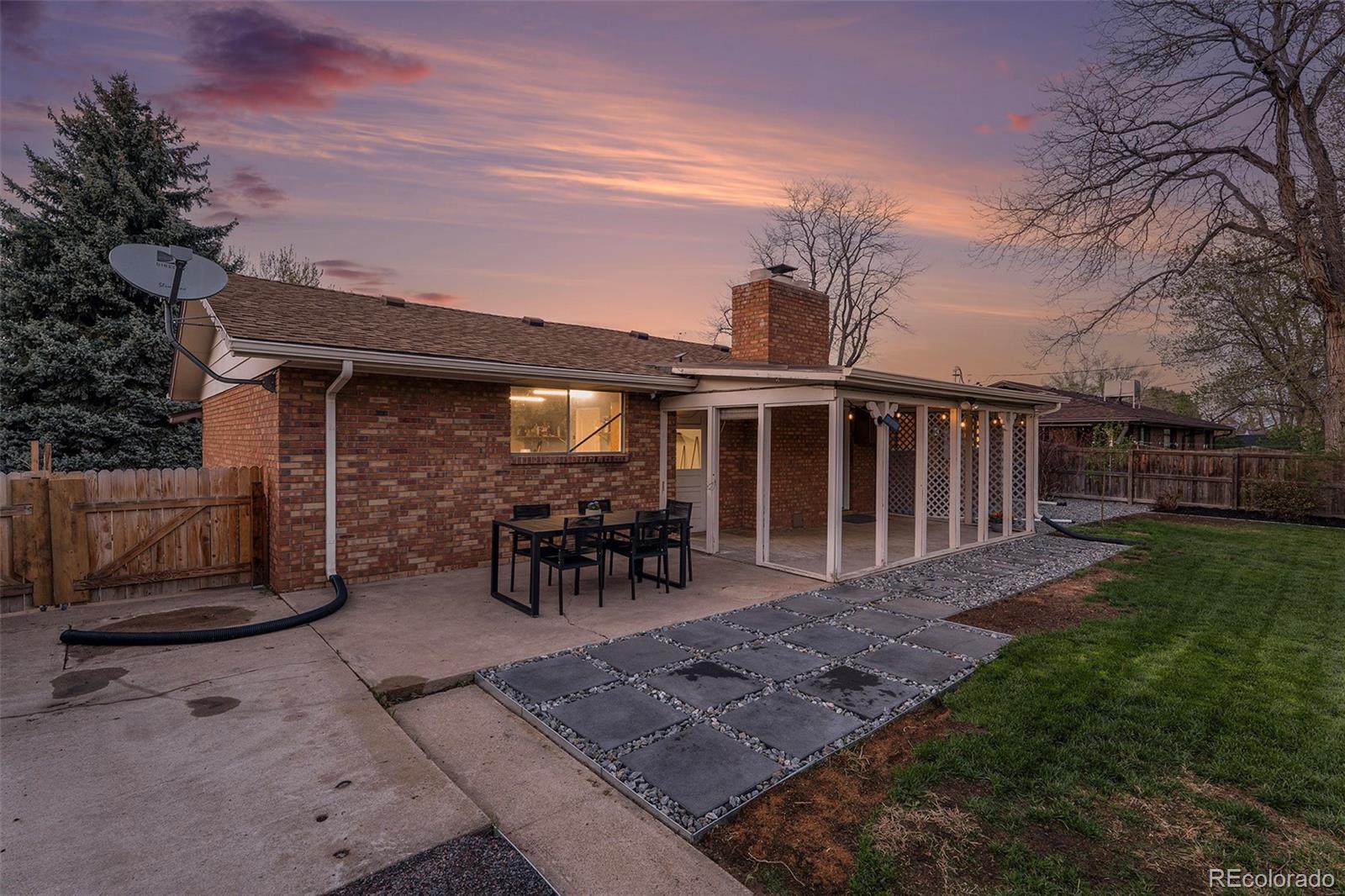 11676 West 37th Place Wheat Ridge, CO 80033 - Photo 24 of 30 a view of a house with backyard and sitting area