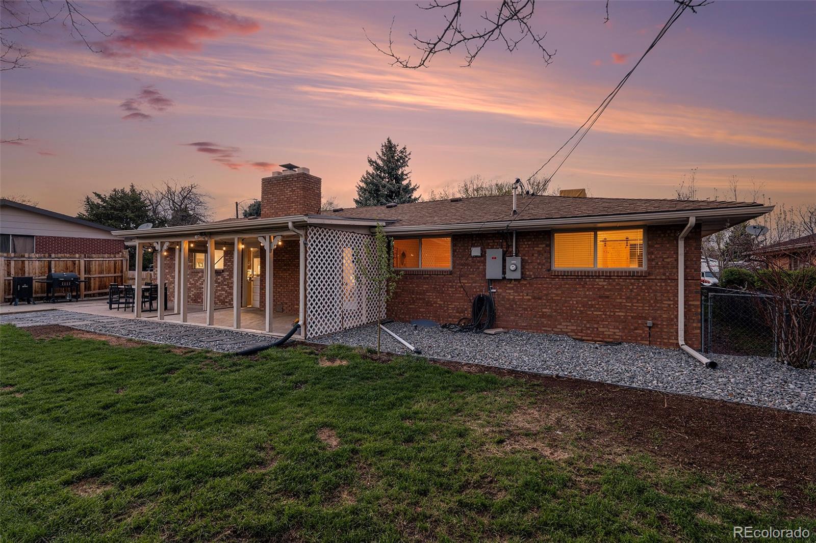 11676 West 37th Place Wheat Ridge, CO 80033 - Photo 26 of 30 a view of a house with roof deck