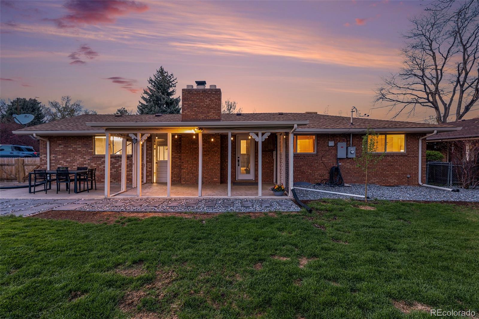 11676 West 37th Place Wheat Ridge, CO 80033 - Photo 27 of 30 front view of a house with a yard