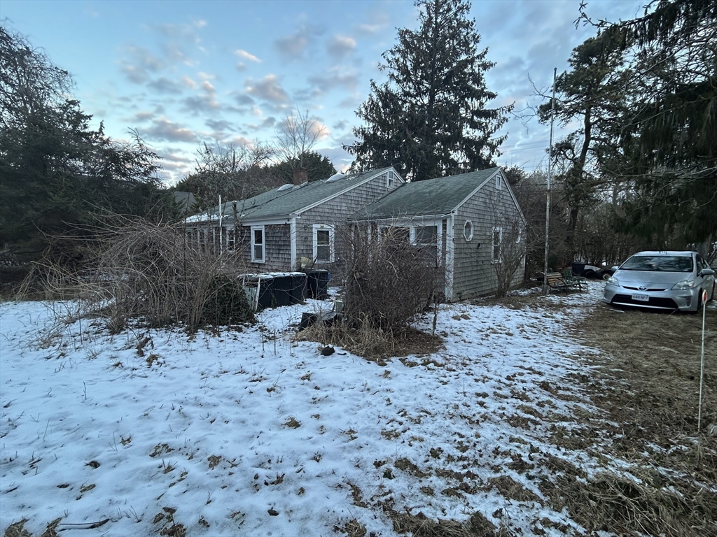 1805 Main Street Chatham, MA 02633 - Photo 4 of 6 a front view of a house with a yard