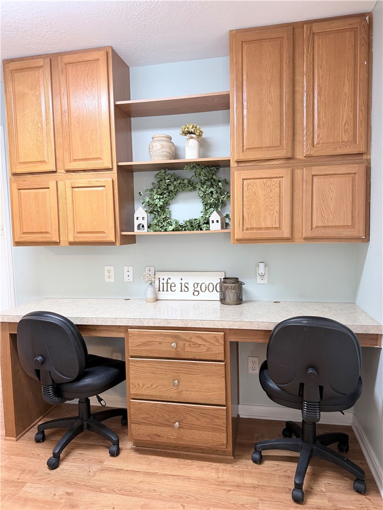 1029 Fallbrook Loop College Station, TX 77845 - Photo 24 of 34 a view of a workspace with furniture and a window
