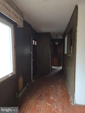 a room with a bed and a window