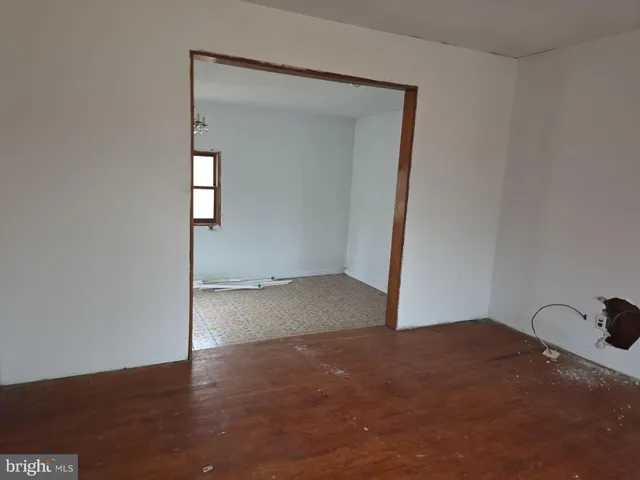 a white refrigerator freezer and a stove sitting inside of a kitchen