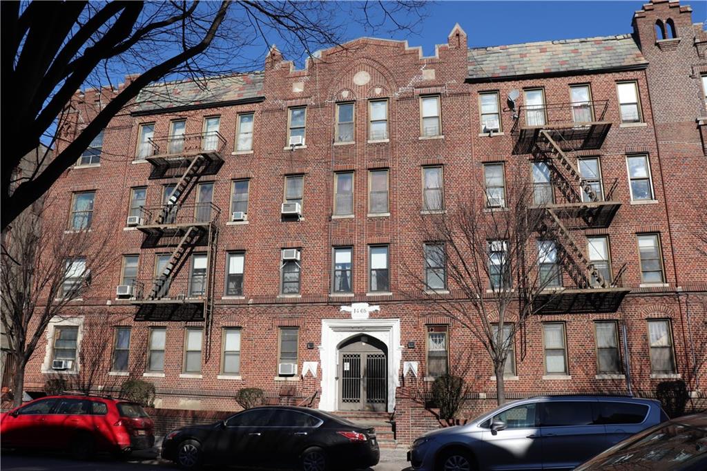 1405 Prospect Place, Unit B14 Brooklyn, NY 11213 - Photo 1 of 16 a front view of a building with parking space