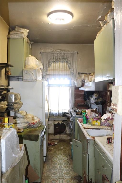 1405 Prospect Place, Unit B14 Brooklyn, NY 11213 - Photo 3 of 16 a kitchen that has a sink and a stove