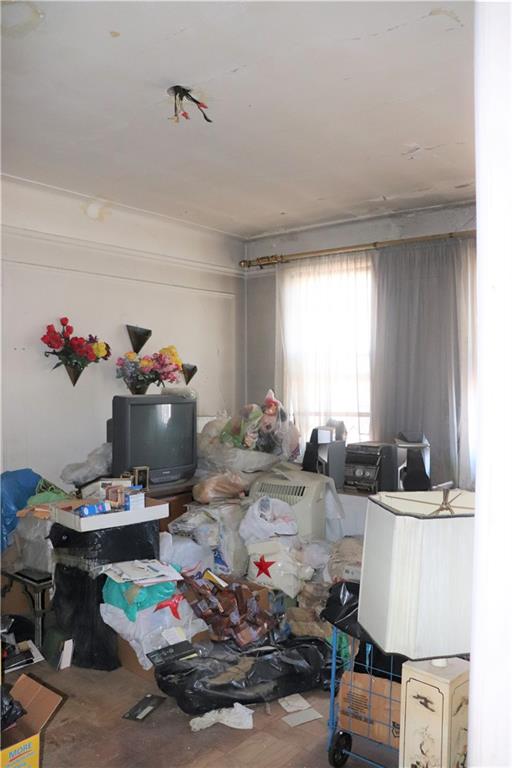 1405 Prospect Place, Unit B14 Brooklyn, NY 11213 - Photo 8 of 16 a view of a workspace with furniture and a window