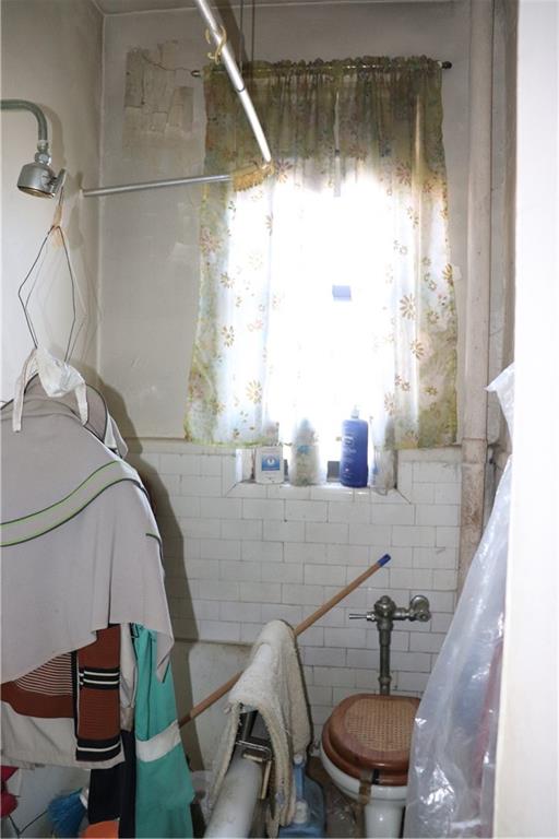 1405 Prospect Place, Unit B14 Brooklyn, NY 11213 - Photo 10 of 16 a bathroom with a sink and a mirror
