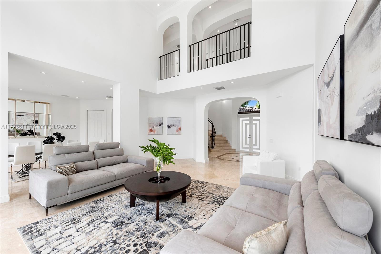 455 Centre Island Golden Beach, FL 33160 - Photo 14 of 67 a living room with furniture potted plant and a rug