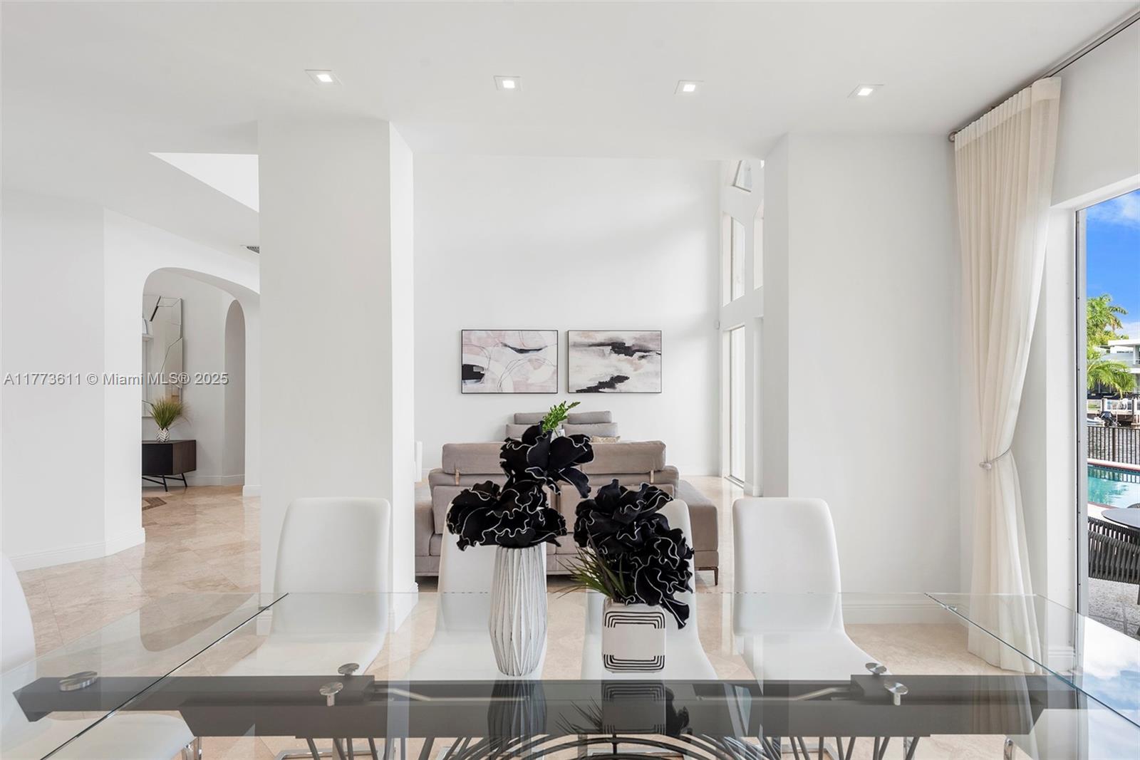 455 Centre Island Golden Beach, FL 33160 - Photo 15 of 67 a view of a living room and dining room