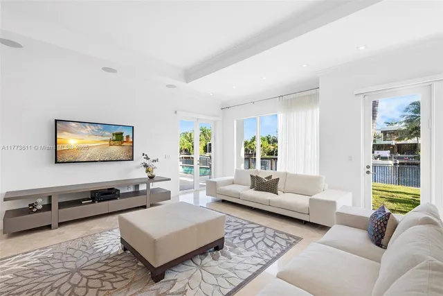 a kitchen with a stove a sink and a refrigerator