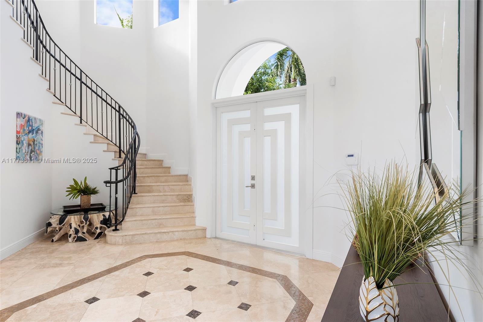 455 Centre Island Golden Beach, FL 33160 - Photo 39 of 67 a view of entryway with a front door