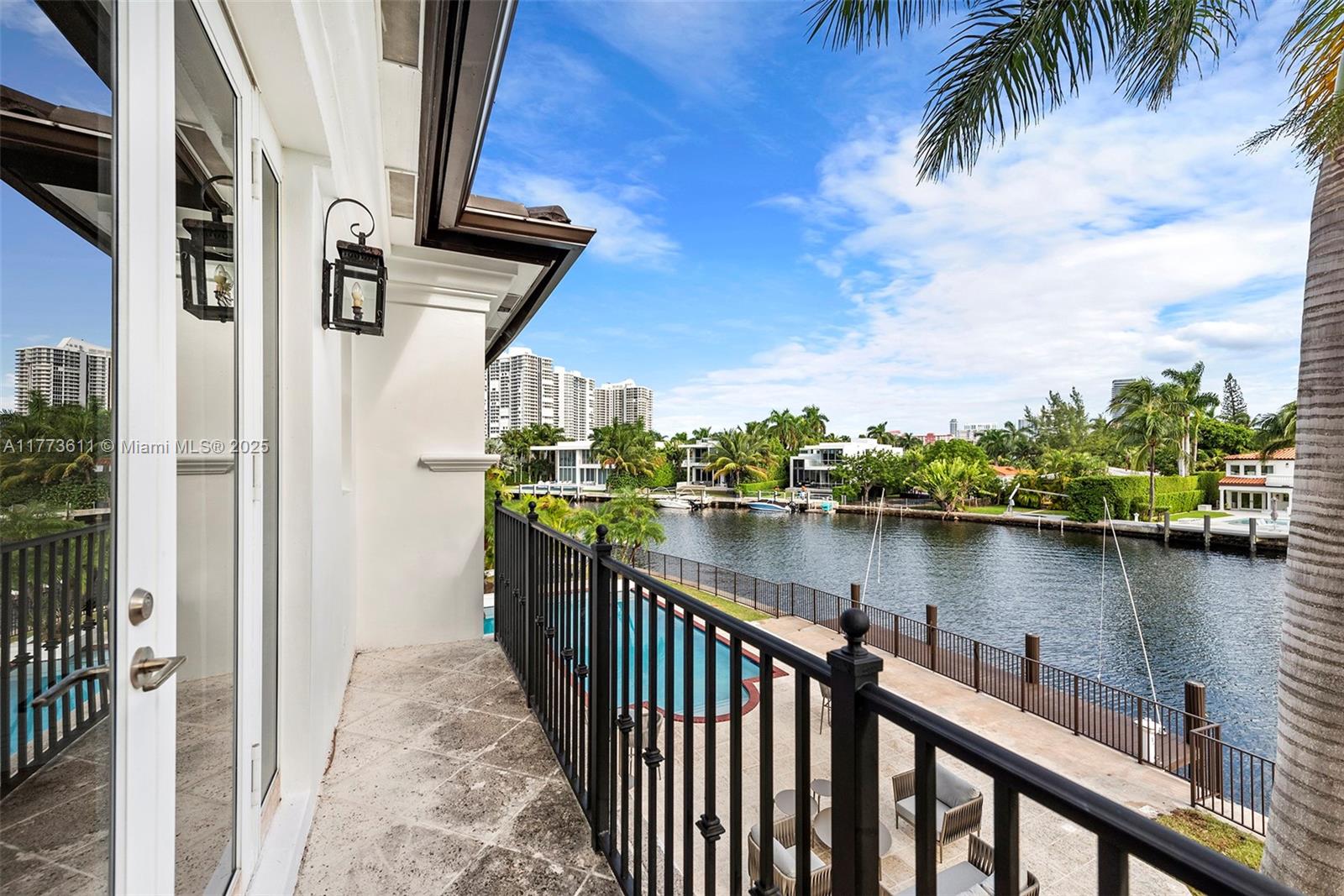 455 Centre Island Golden Beach, FL 33160 - Photo 50 of 67 a view of a lake from a balcony