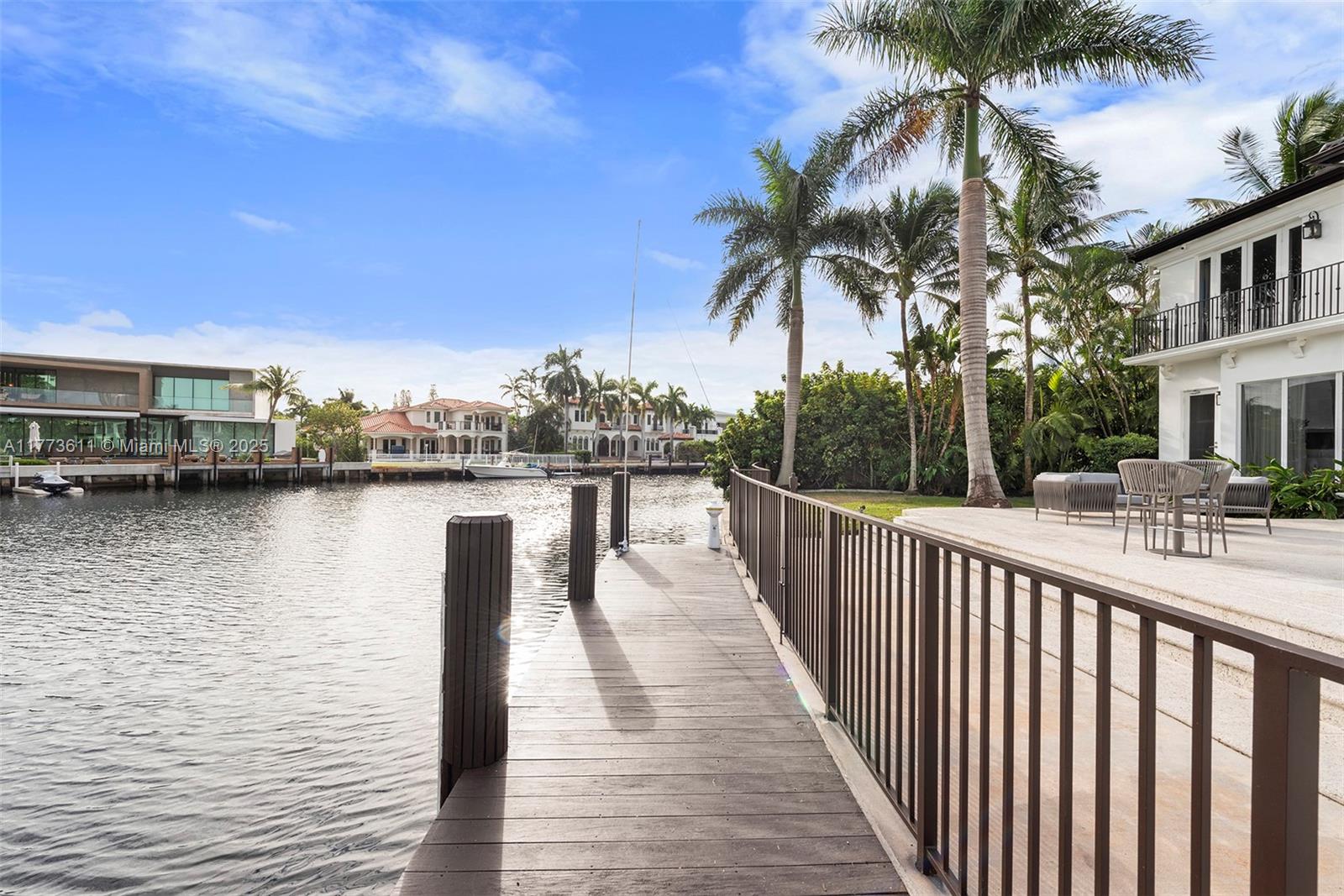455 Centre Island Golden Beach, FL 33160 - Photo 65 of 67 a view of balcony with outdoor space and lake view