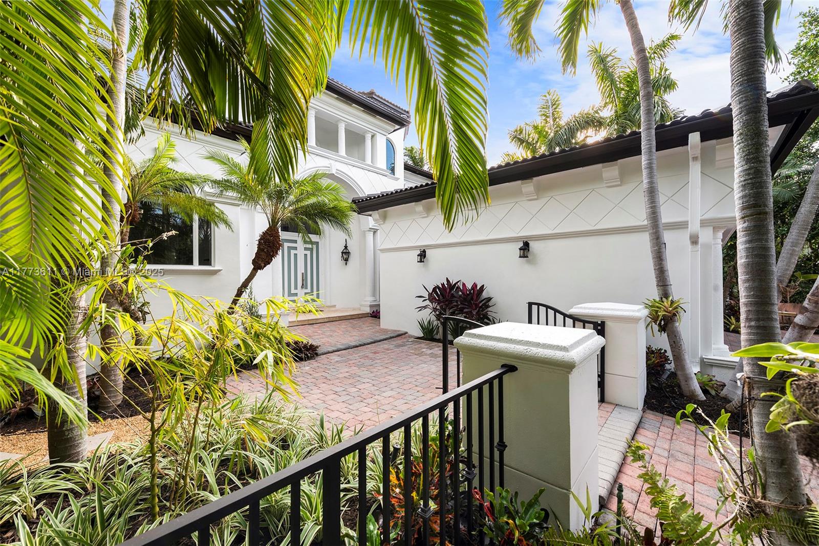 455 Centre Island Golden Beach, FL 33160 - Photo 9 of 67 a view of a house with a patio
