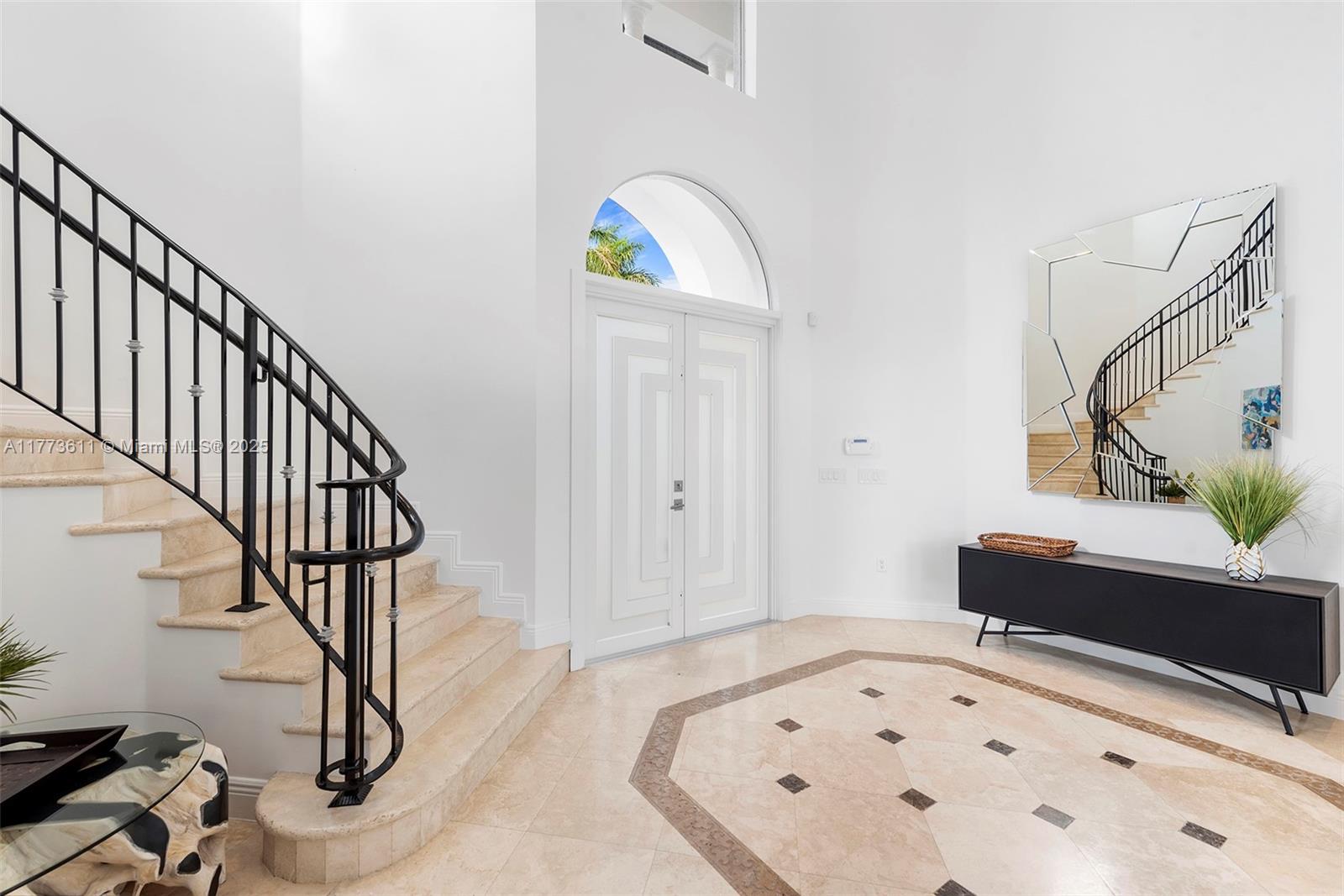 455 Centre Island Golden Beach, FL 33160 - Photo 10 of 67 a bedroom with a bed and a dresser