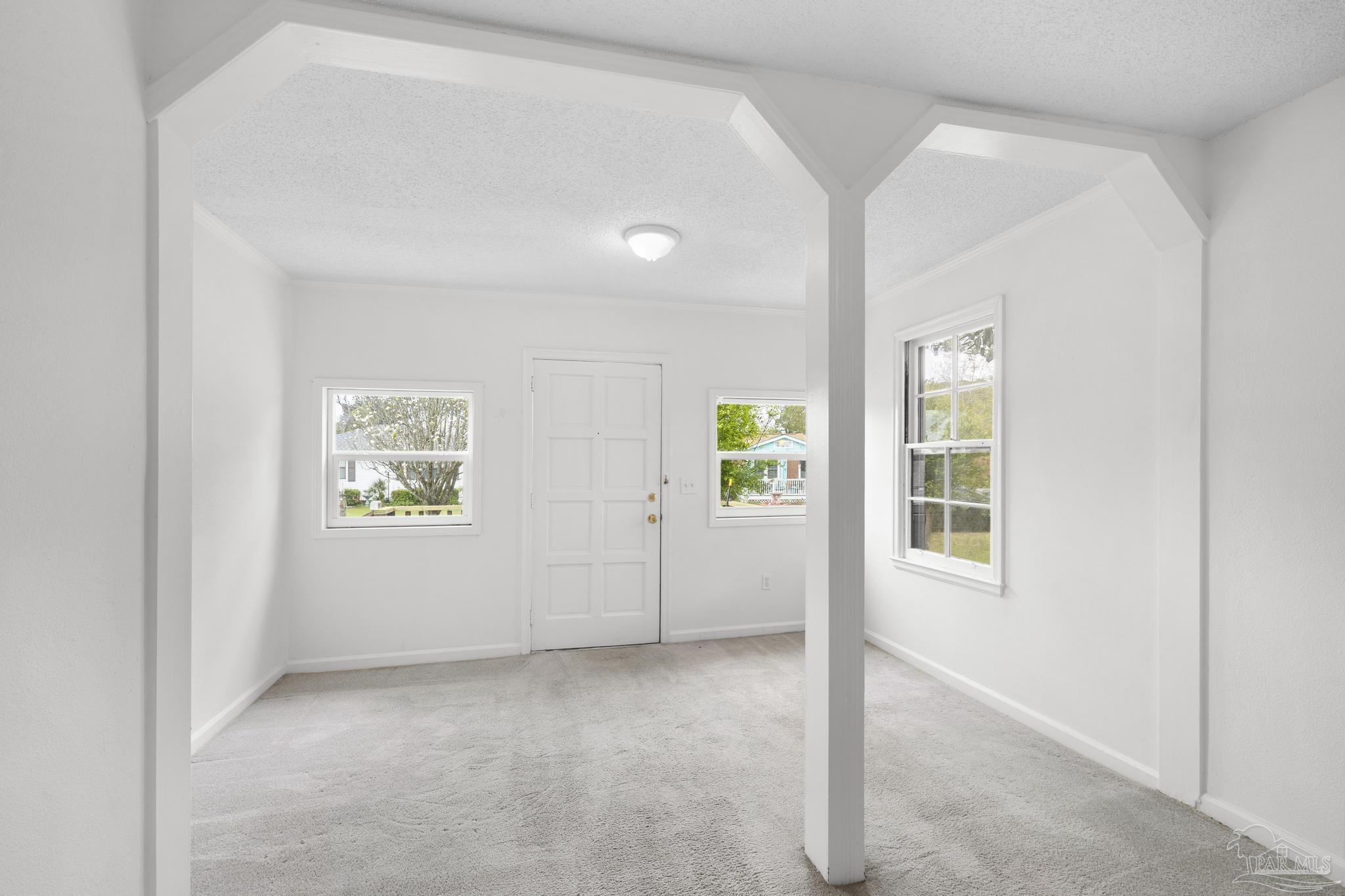 208 Berry Road Pensacola, FL 32507 - Photo 11 of 41 an empty room with windows