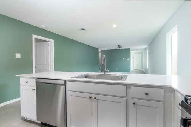 a sink with a mirror