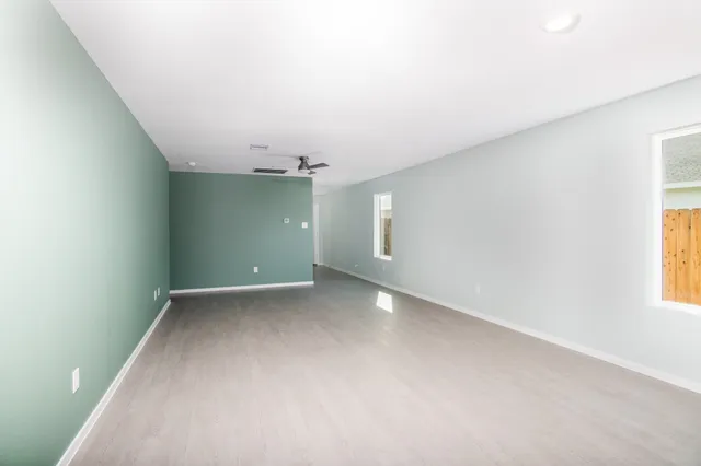 an empty room with windows