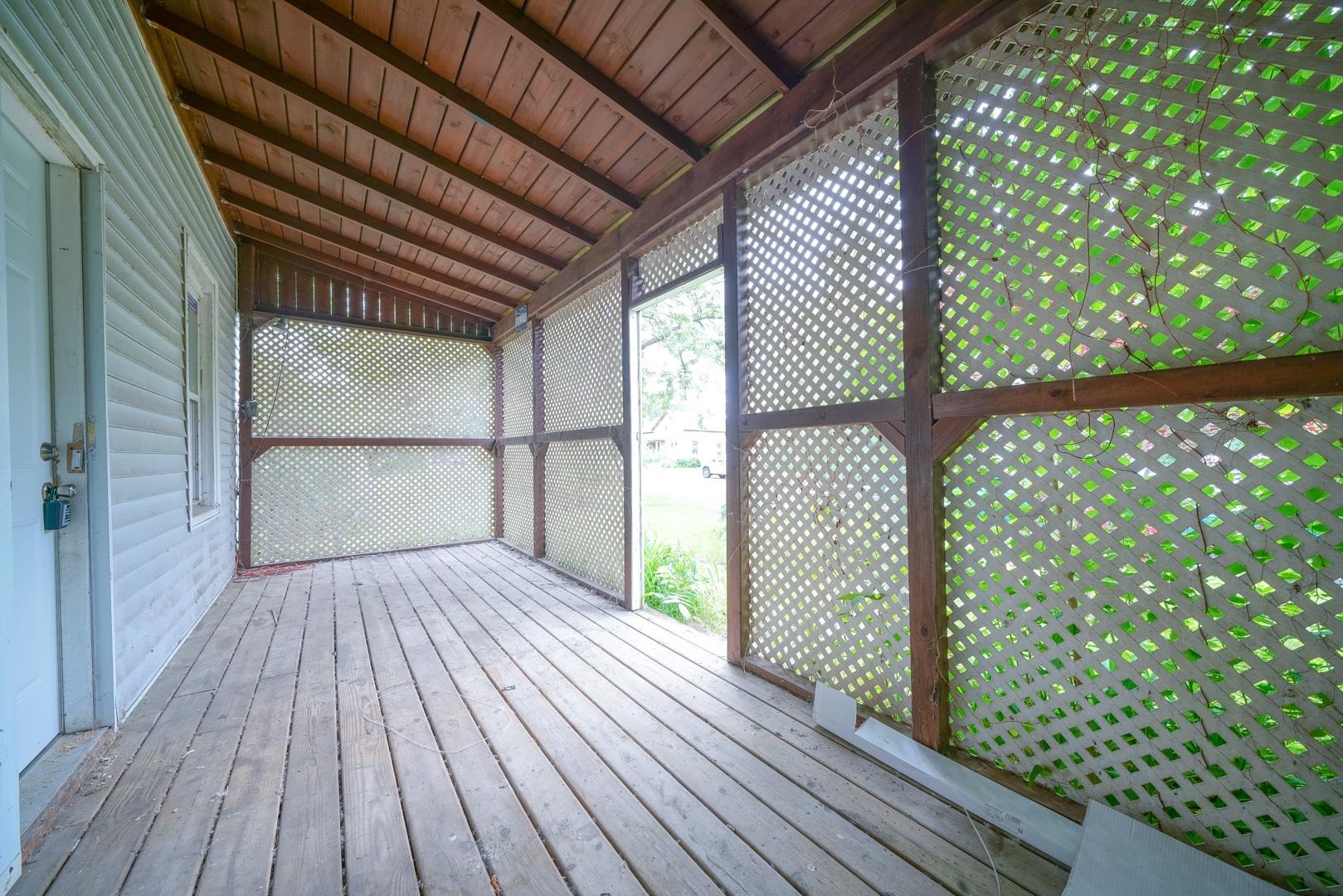 203 Adams Street Ridott, IL 61067 - Photo 5 of 24 a view of outdoor space with wooden floor