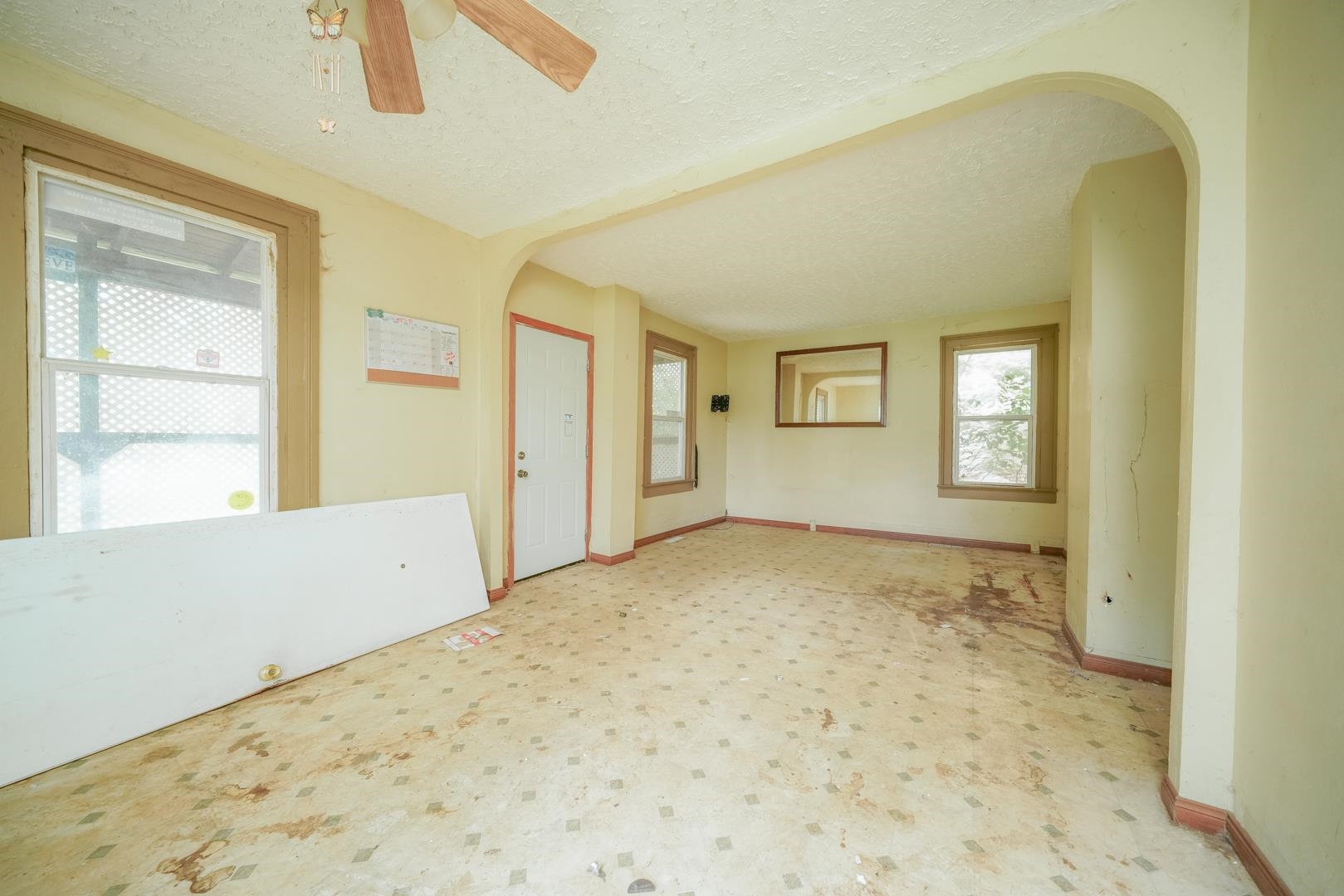 203 Adams Street Ridott, IL 61067 - Photo 7 of 24 a view of an empty room and window