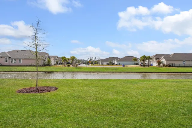 a view of a garden with a lake
