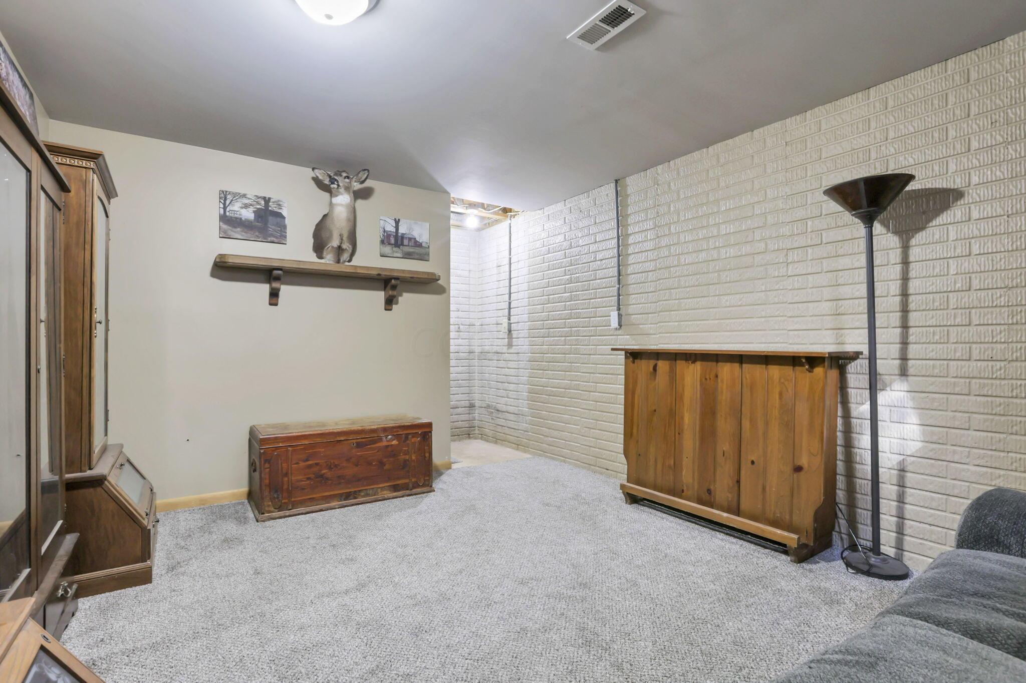 550 Country Club Road Columbus, OH 43213 - Photo 38 of 60 Finished basement entertainment/living space